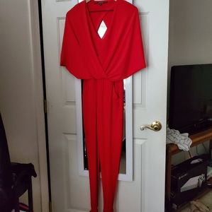 Guess red jumpsuit with open back